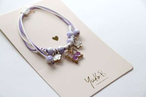 Pulsera de Mariposas Lila